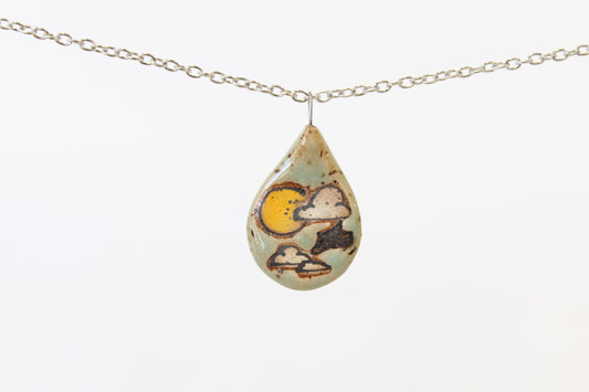 1076. Sun and Clouds Flat Necklace - .75" x 1.5"