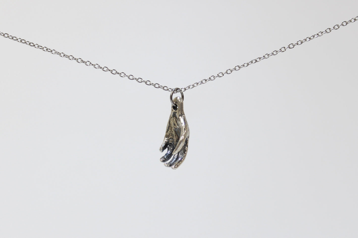 Hand Pendant Necklace. Sterling silver. 1" x 2.5". Select chain length 16, 18, 20 inch