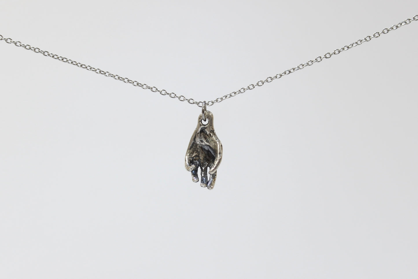 Hand Pendant Necklace. Sterling silver. 1" x 2.5". Select chain length 16, 18, 20 inch