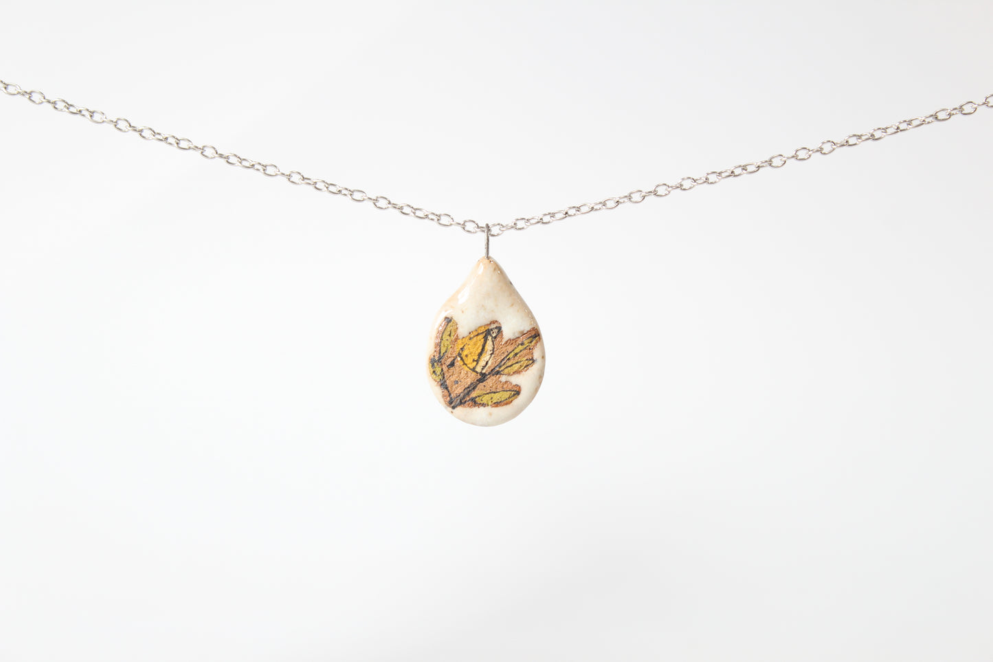 201. Yellow Bird Disc Necklace - 1" x 2"