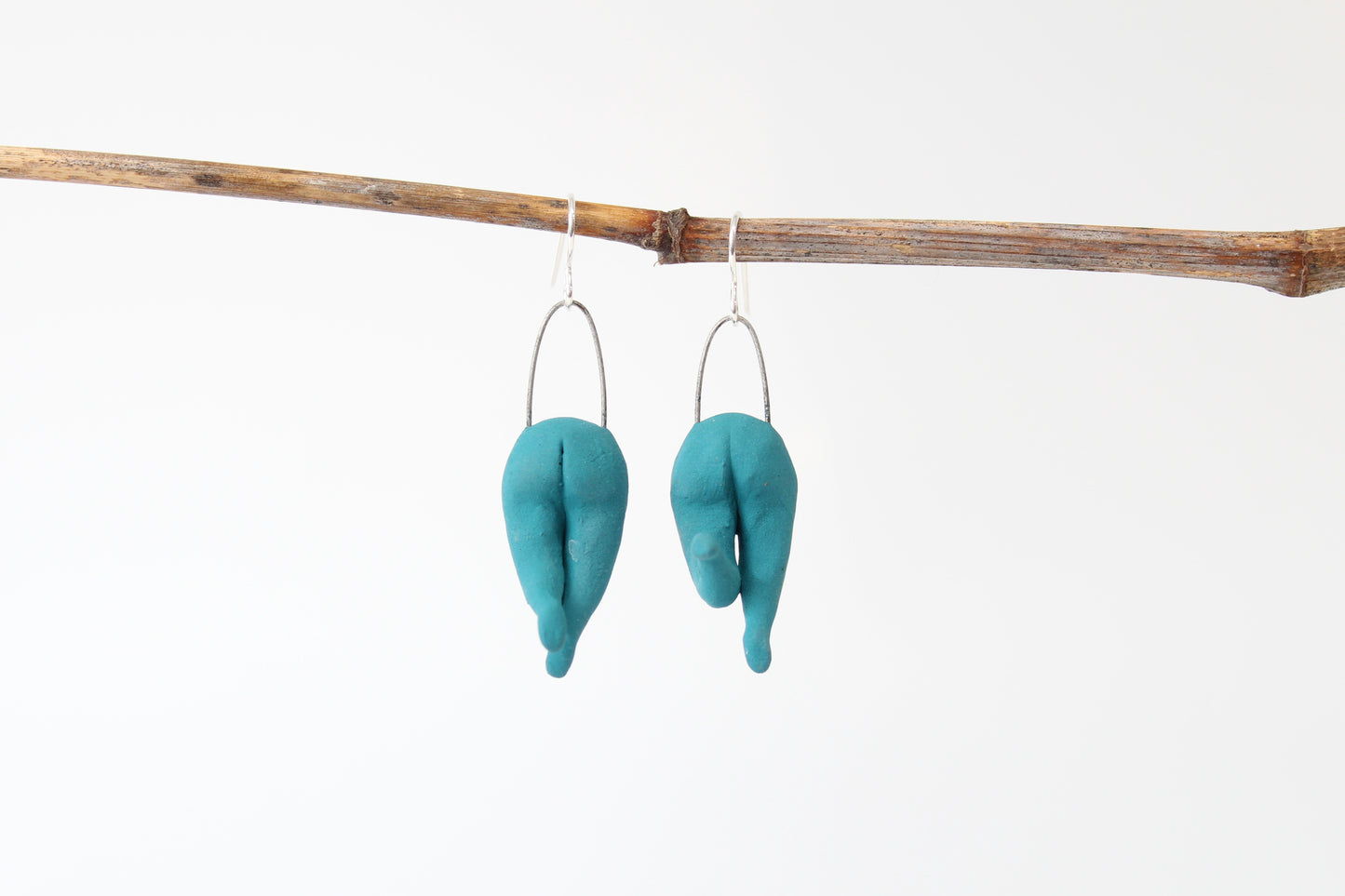 060. Teal Underglaze Buddy Butts Earrings with Sterling Silver Hooks - 2" h x 1/2" w