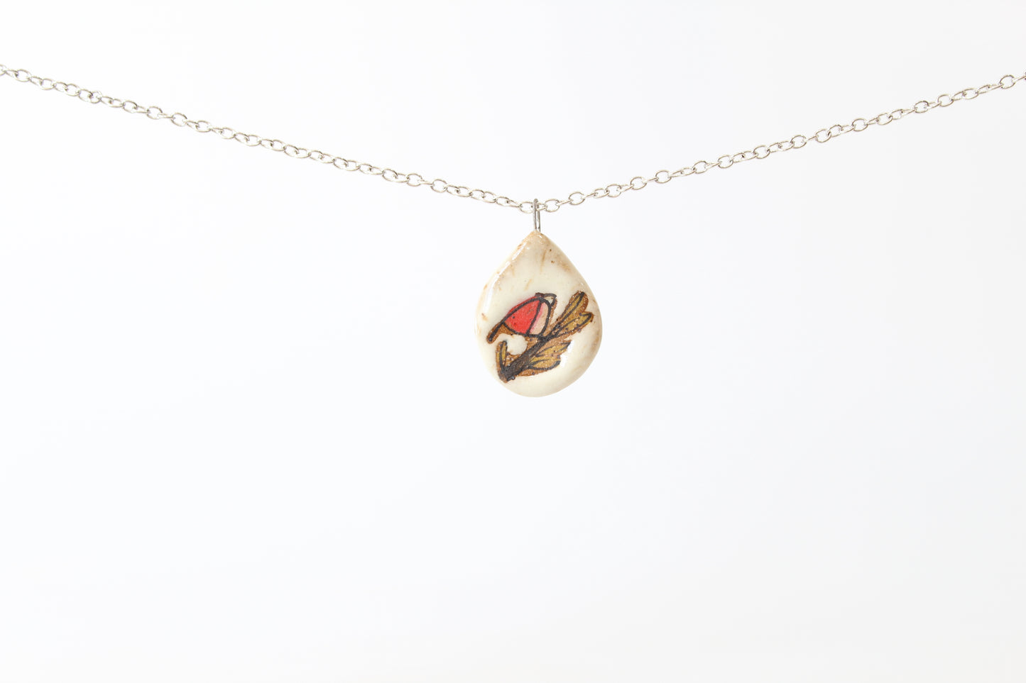 052. Red Bird Disk Necklace - .75" x 1.5"