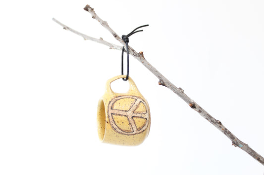 067. Textured Peace Sign Mug - Yellow - Ornament size - 2 oz.