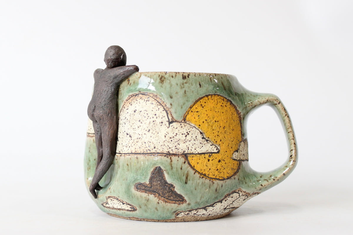 004. Sun and Clouds Buddy Mug - 13oz.