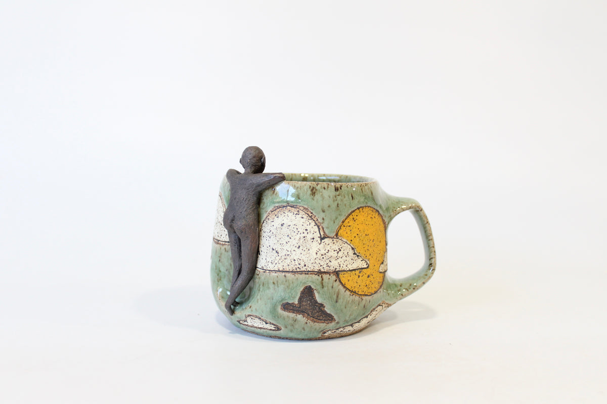 004. Sun and Clouds Buddy Mug - 13oz.