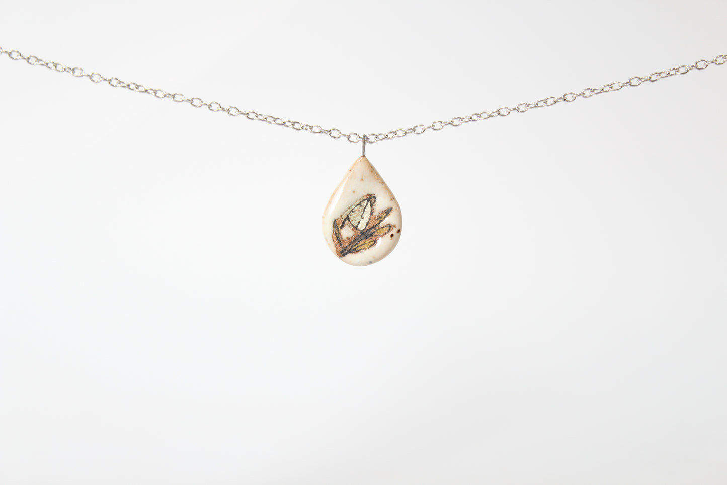 211. Light Teal Bird Disc Necklace - 1" x 2"