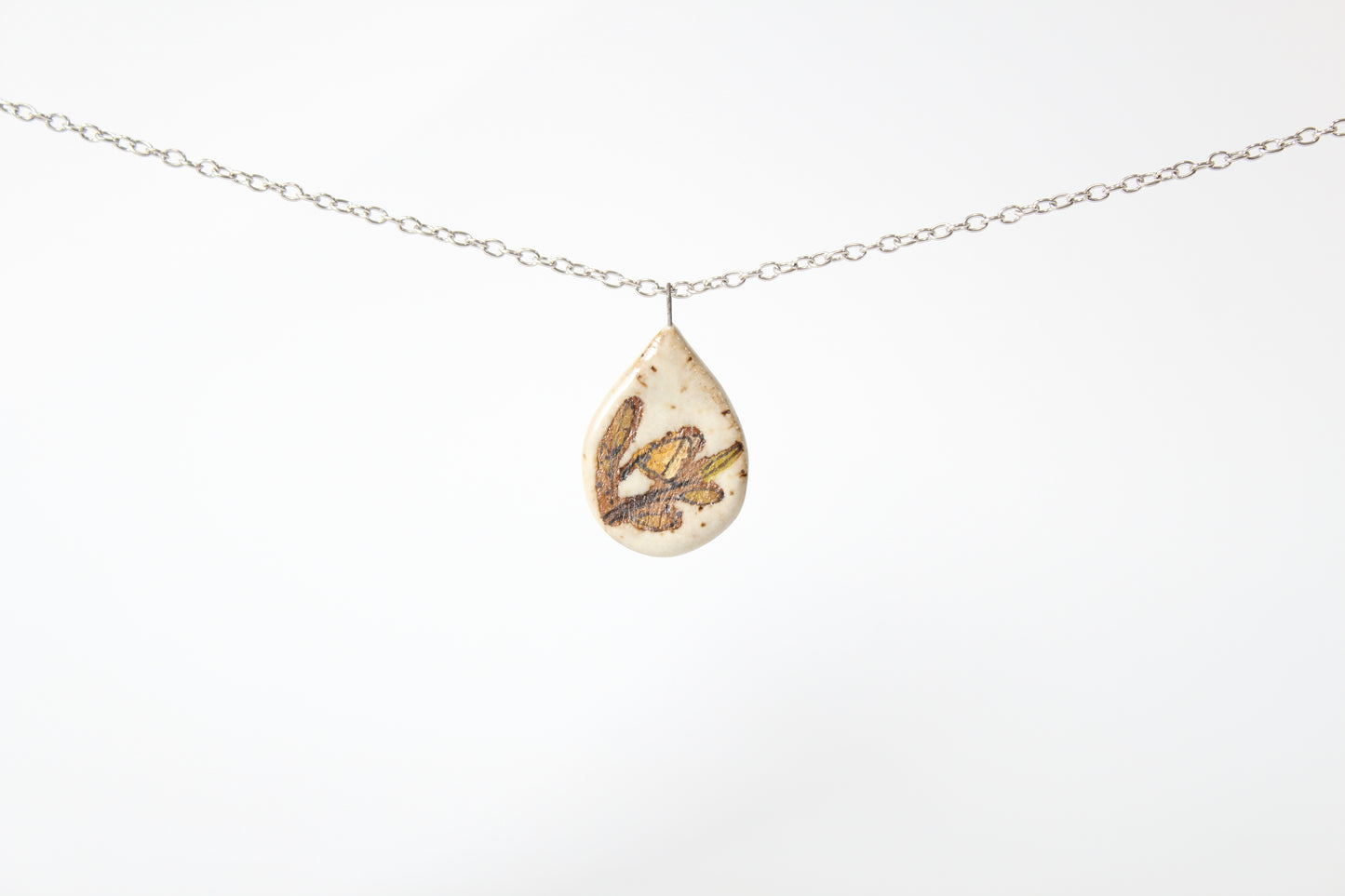 202. Yellow Bird Disc Necklace - 1" x 2"