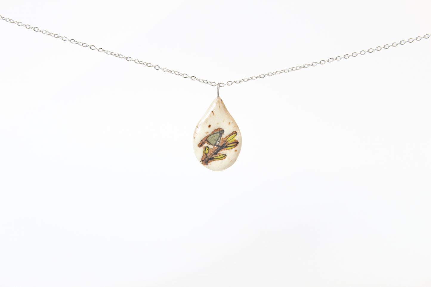 105. Muted Green Bird Flat Necklace - 1" x 2"