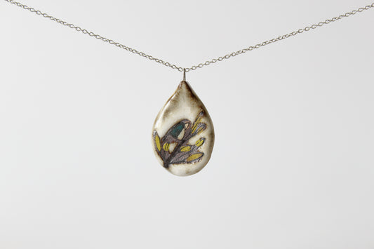 080. Teal Bird with Toast Glaze Necklace on 18 inch stainless steel chain. 1" x 1" pendant