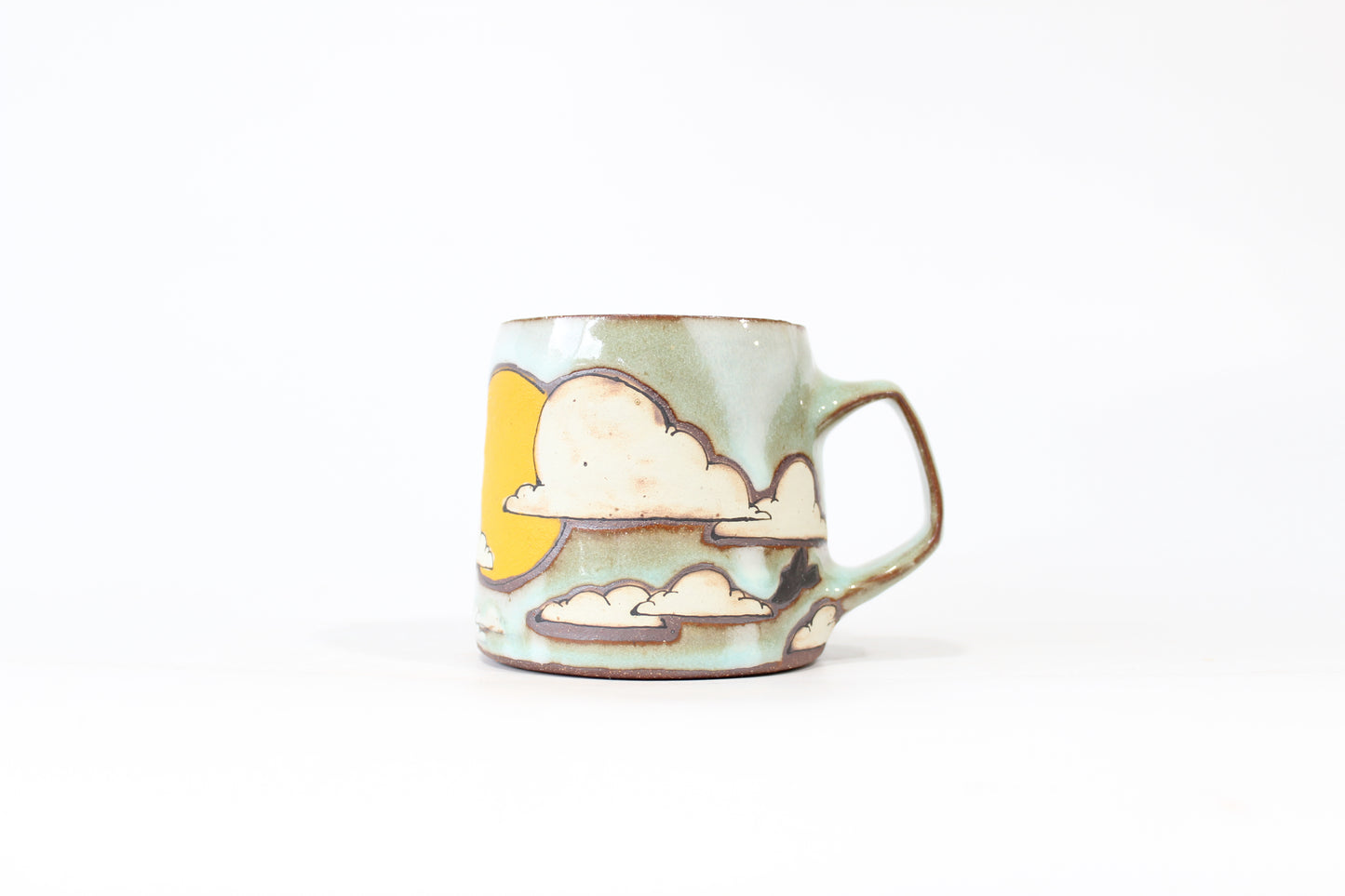 027. Clouds and Sun Mug 13oz.