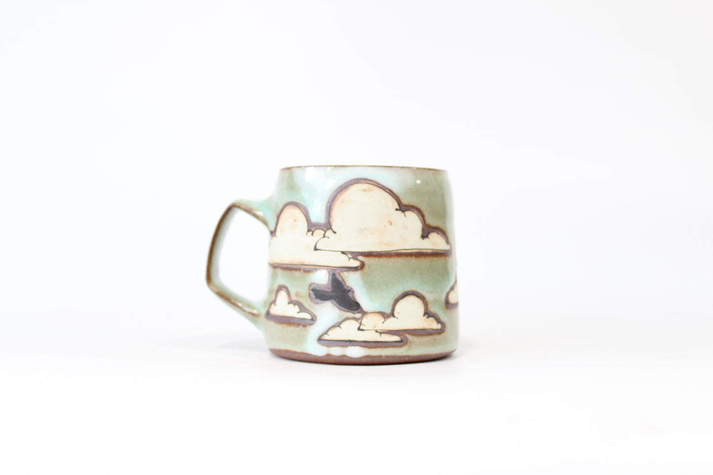 027. Clouds and Sun Mug 13oz.