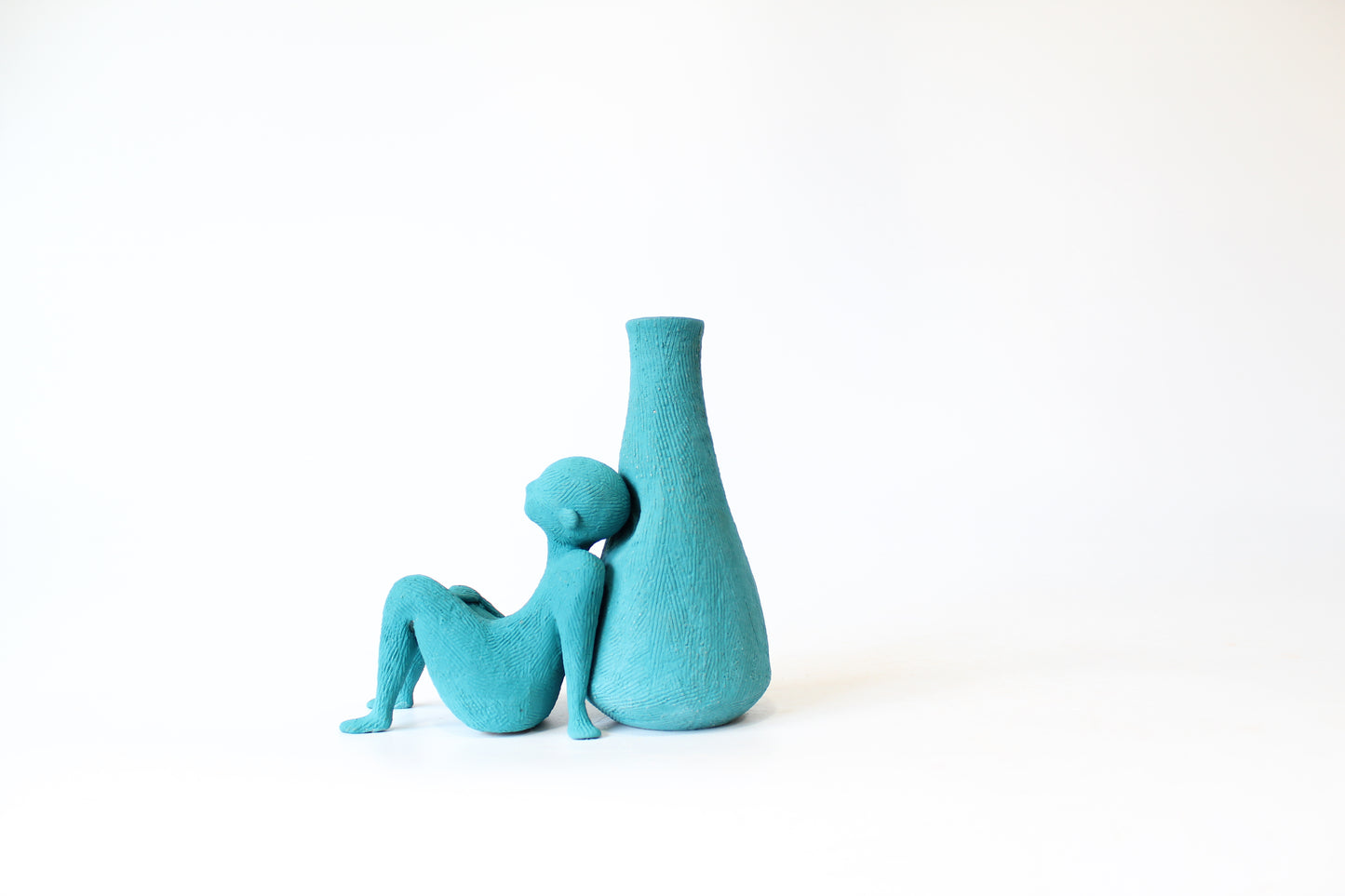 003. Teal Vase Buddy - 5.5" height x 3" width x 6" depth (two pieces)