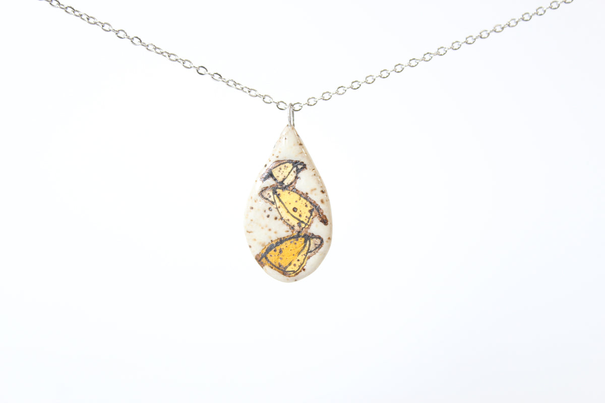 128. Yellow Bird Stack Disk Necklace - .75" x 1.5"