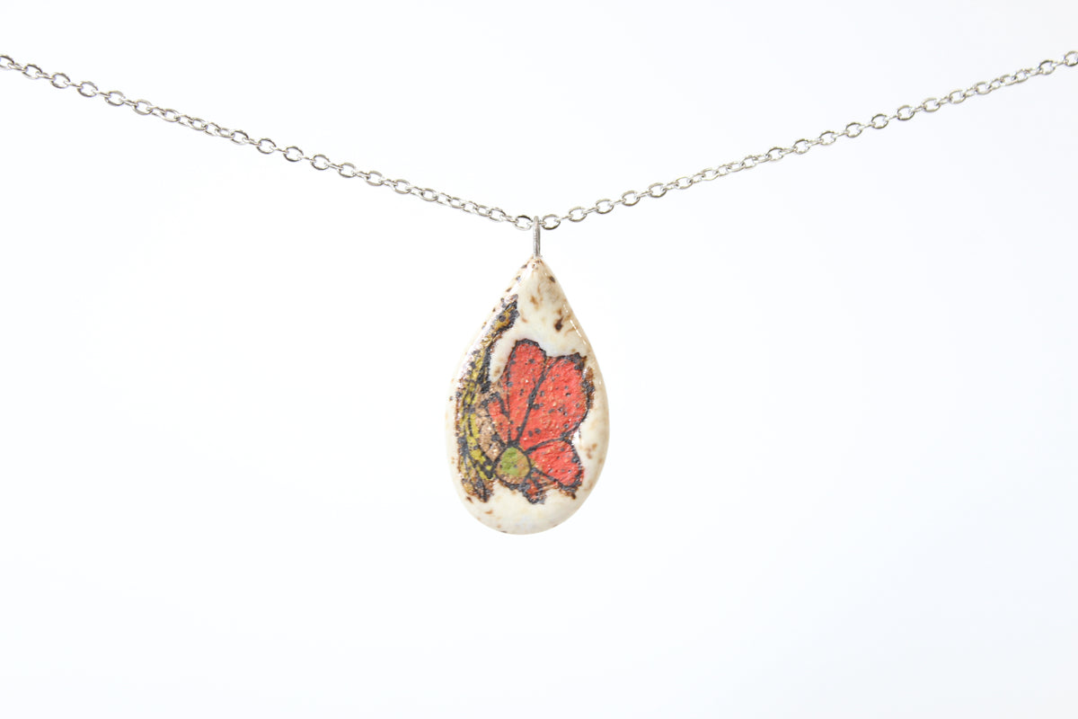 129. Red Flower Disk Necklace - .75" x 1.5"